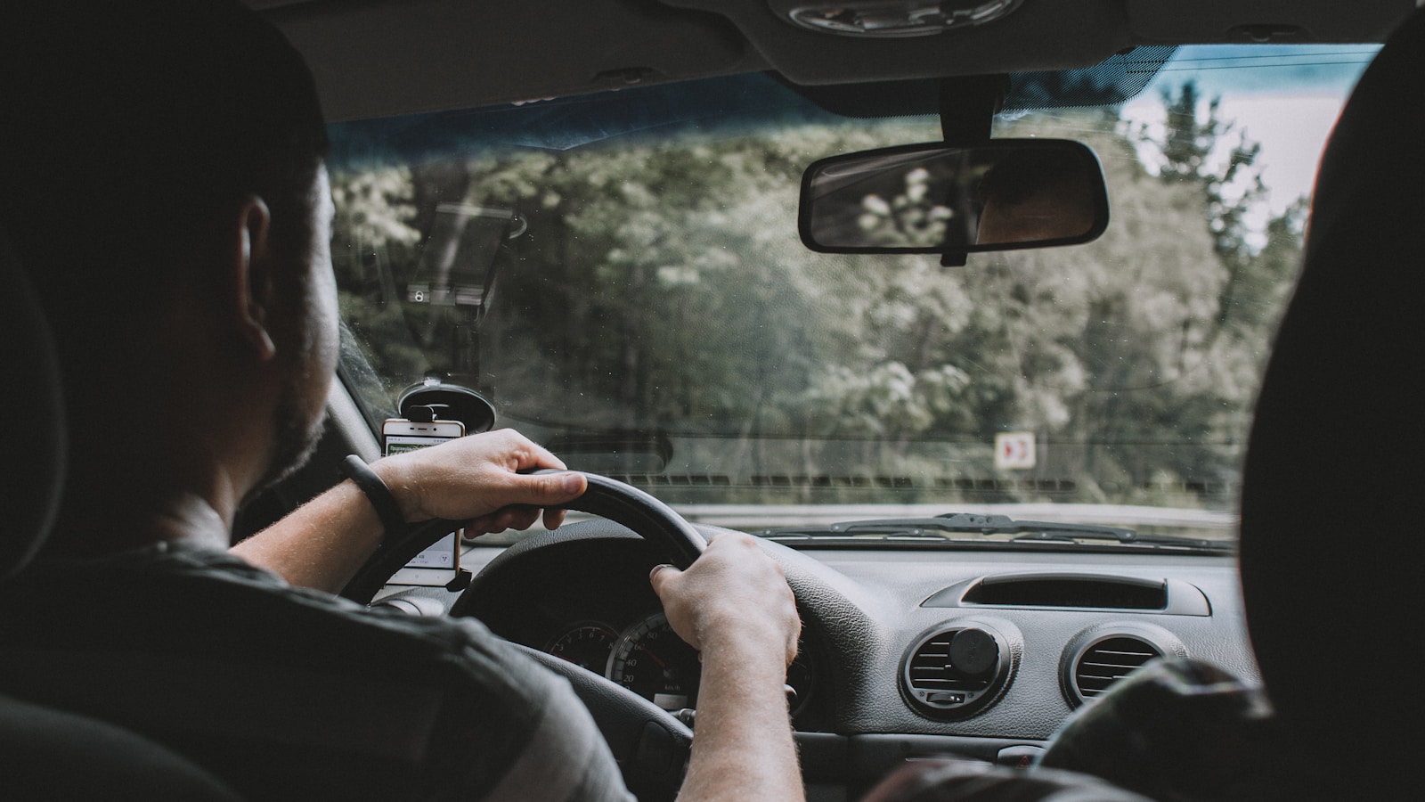 person driving car during daytime, auto